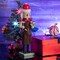 Ornativity Christmas Toy Maker Nutcracker – Red and Green Wooden Nutcracker Man with Brown Workers Apron and Toy Car and Toy Hammer in Hand Xmas Themed Holiday Nut Cracker Doll Figure Decorations